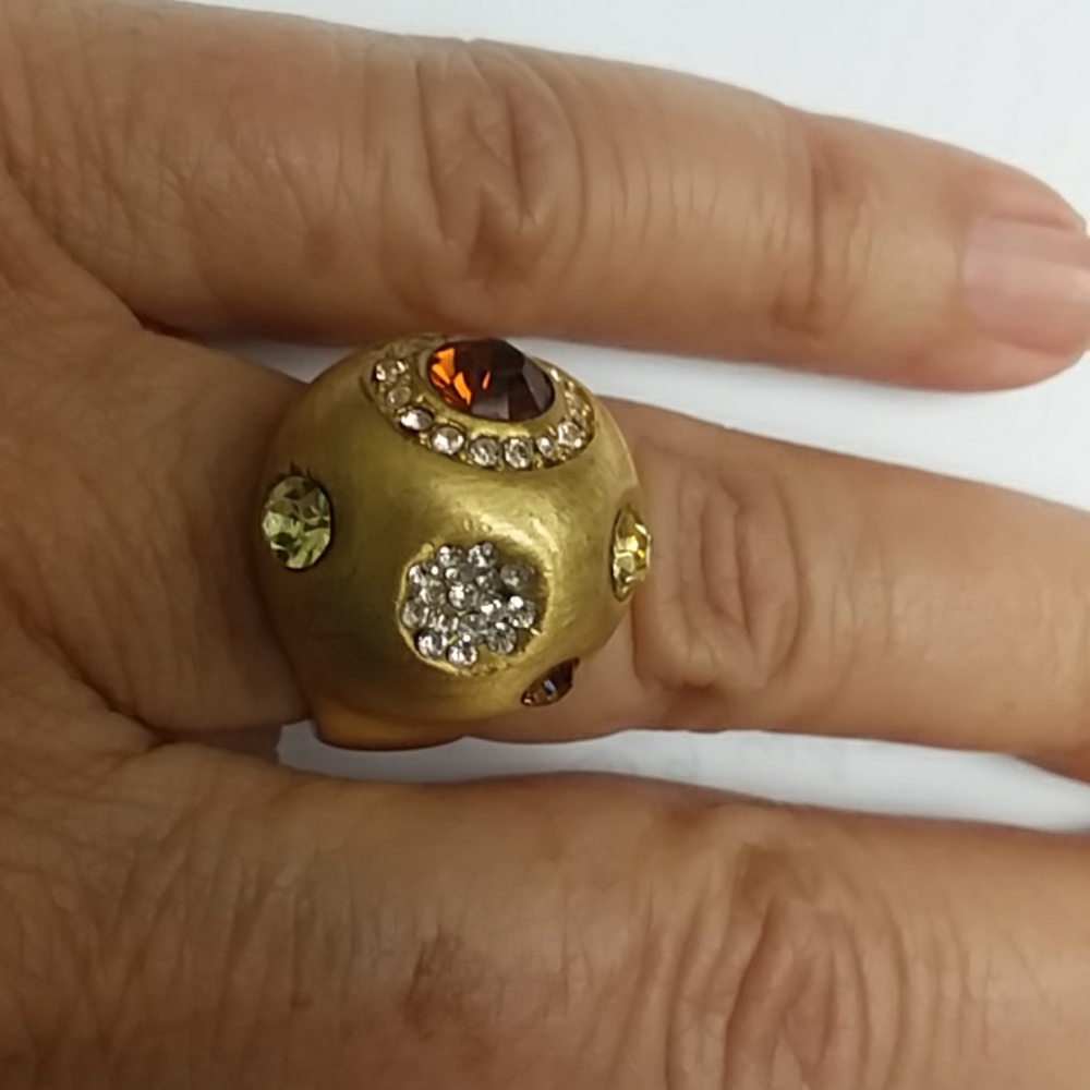 Gold tone ring with stones